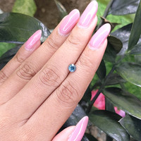 0.72 Ct. Greenish Blue Sapphire from Madagascar Life Style