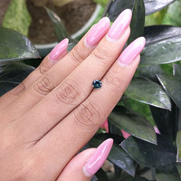 0.46 Ct. Bluish Green Sapphire from Madagascar Life Style