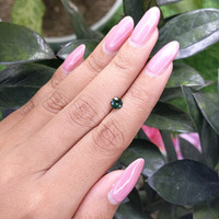 0.53 Ct. Green Sapphire from Madagascar Life Style