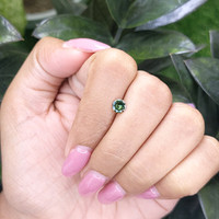 0.47 Ct. Yellowish Green Sapphire from Madagascar Life Style