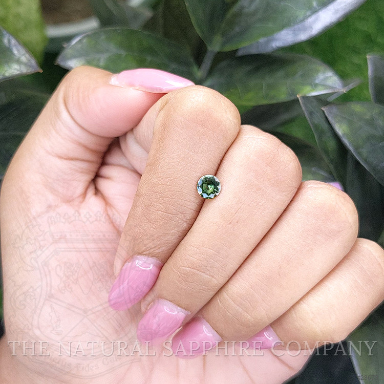 0.47 Ct. Yellowish Green Sapphire from Madagascar