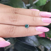 0.45 Ct. Bluish Green Sapphire from Madagascar Life Style