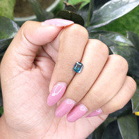 0.96 Ct. Bluish Green Sapphire from Madagascar Life Style