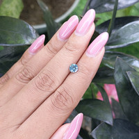 0.70 Ct. Greenish Blue Sapphire from Madagascar Life Style