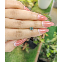 1.12 Ct. Green Sapphire from Madagascar Life Style