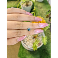 1.04 Ct. Bluish Green Sapphire from Madagascar Life Style