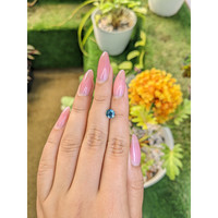 1.04 Ct. Bluish Green Sapphire from Madagascar Life Style