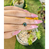 3.16 Ct. Yellowish Green Sapphire from Madagascar Life Style