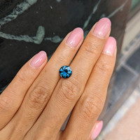 2.12 Ct. Bluish Green Sapphire from Madagascar Life Style