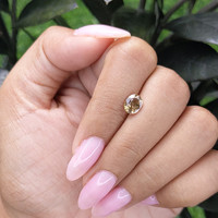 1.12 Ct. Greenish Brown Sapphire from Madagascar Life Style