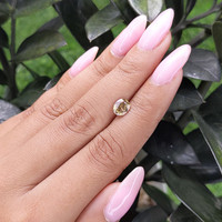 1.12 Ct. Greenish Brown Sapphire from Madagascar Life Style