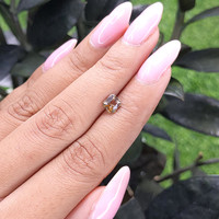 1.02 Ct. Greenish Brown Sapphire from Ceylon (Sri Lanka) Life Style