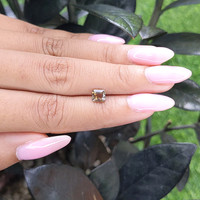 1.02 Ct. Greenish Brown Sapphire from Ceylon (Sri Lanka) Life Style