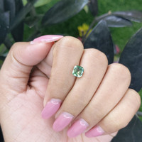 1.55 Ct. Yellowish Green Sapphire from Madagascar Life Style