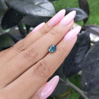 1.58 Ct. Bluish Green Sapphire from Madagascar Life Style