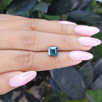 2.58 Ct. Greenish Blue Sapphire from Madagascar Life Style
