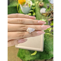 10.96 Ct. Grey Rough Sapphire from Ceylon (Sri Lanka) Life Style