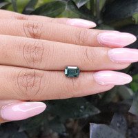 1.57 Ct. Bluish Green Sapphire from Madagascar Life Style