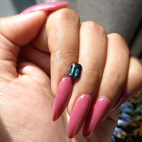 1.57 Ct. Bluish Green Sapphire from Madagascar Life Style