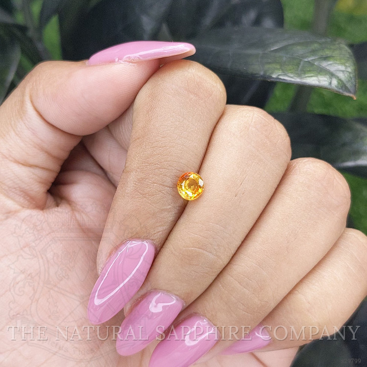 0.80 Ct. Orangish Yellow Sapphire from Madagascar