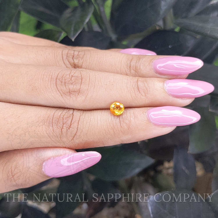0.80 Ct. Orangish Yellow Sapphire from Madagascar