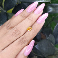 0.78 Ct. Yellow Sapphire from Madagascar Life Style