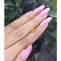 0.68 Ct. Yellow Sapphire from Madagascar Life Style