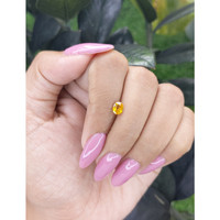 0.68 Ct. Yellow Sapphire from Madagascar Life Style