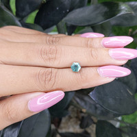 1.11 Ct. Bluish Green Sapphire from Madagascar Life Style