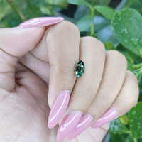 1.34 Ct. Bluish Green Sapphire from Madagascar Life Style