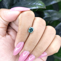 1.18 Ct. Bluish Green Sapphire from Madagascar Life Style