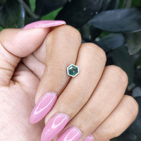 0.97 Ct. Bluish Green Sapphire from Madagascar Life Style