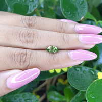 1.17 Ct. Yellowish Green Sapphire from Madagascar Life Style