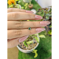 0.66 Ct. Green Sapphire from Madagascar Life Style