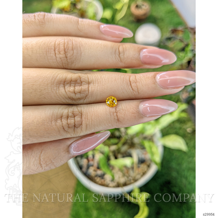 0.70 Ct. Yellowish Orange Sapphire from Ceylon (Sri Lanka)
