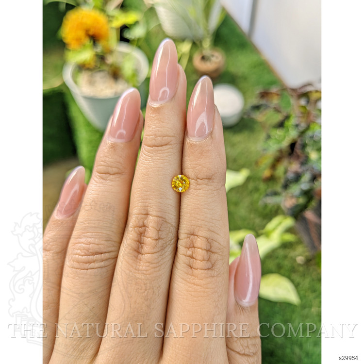 0.70 Ct. Yellowish Orange Sapphire from Ceylon (Sri Lanka)