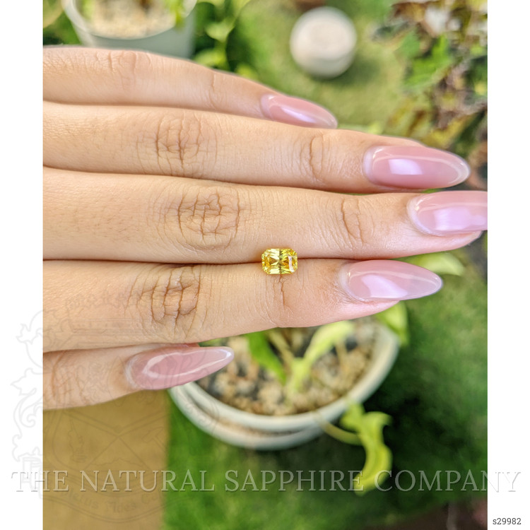 1.24 Ct. Orangish Yellow Sapphire from Ceylon (Sri Lanka)