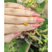 0.97 Ct. Orangish Yellow Sapphire from Ceylon (Sri Lanka) Life Style