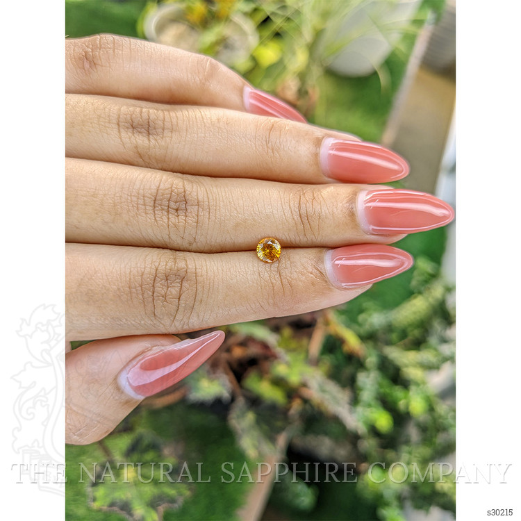 0.58 Ct. Yellowish Orange Sapphire from Ceylon (Sri Lanka)