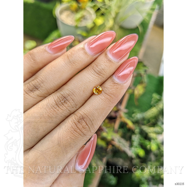 0.58 Ct. Yellowish Orange Sapphire from Ceylon (Sri Lanka)
