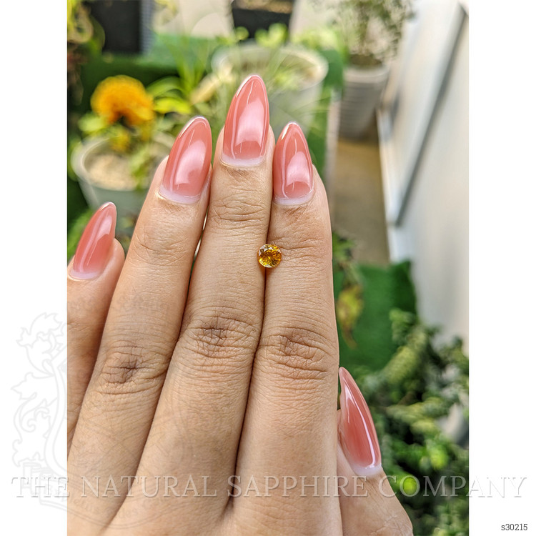 0.58 Ct. Yellowish Orange Sapphire from Ceylon (Sri Lanka)