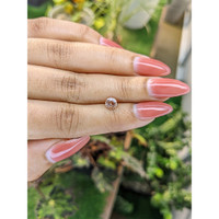 0.77 Ct. Peach Sapphire from Ceylon (Sri Lanka) Life Style