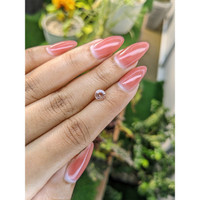 0.77 Ct. Peach Sapphire from Ceylon (Sri Lanka) Life Style