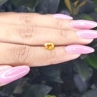 1.30 Ct. Orangish Yellow Sapphire from Ceylon (Sri Lanka) Life Style