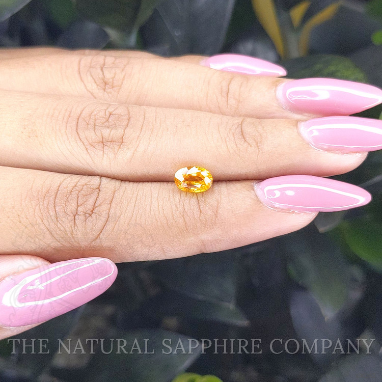 1.30 Ct. Orangish Yellow Sapphire from Ceylon (Sri Lanka)