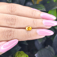 0.94 Ct. Orangish Yellow Sapphire from Ceylon (Sri Lanka) Life Style