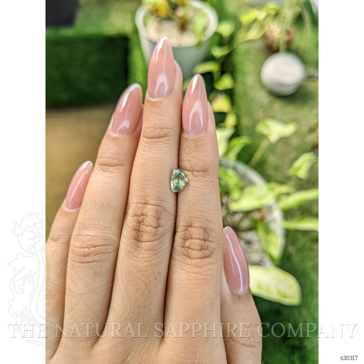 1.16 Ct. Yellowish Green Sapphire from Ceylon (Sri Lanka)