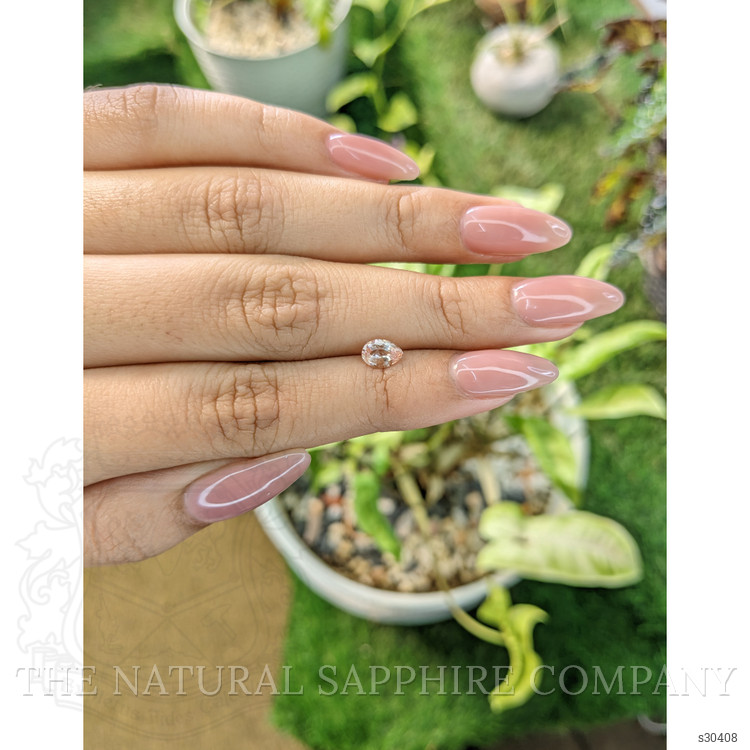 0.64 Ct. Peach Sapphire from Ceylon (Sri Lanka)