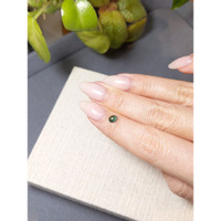 0.59 Ct. Bluish Green Cabochon Sapphire from Ceylon (Sri Lanka) Life Style