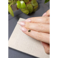 0.67 Ct. Green Cabochon Sapphire from Ceylon (Sri Lanka) Life Style